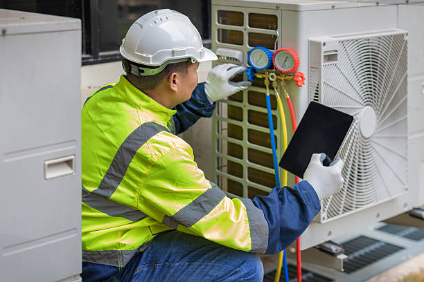 Professional Hvac technician working in Adelphia, NJ